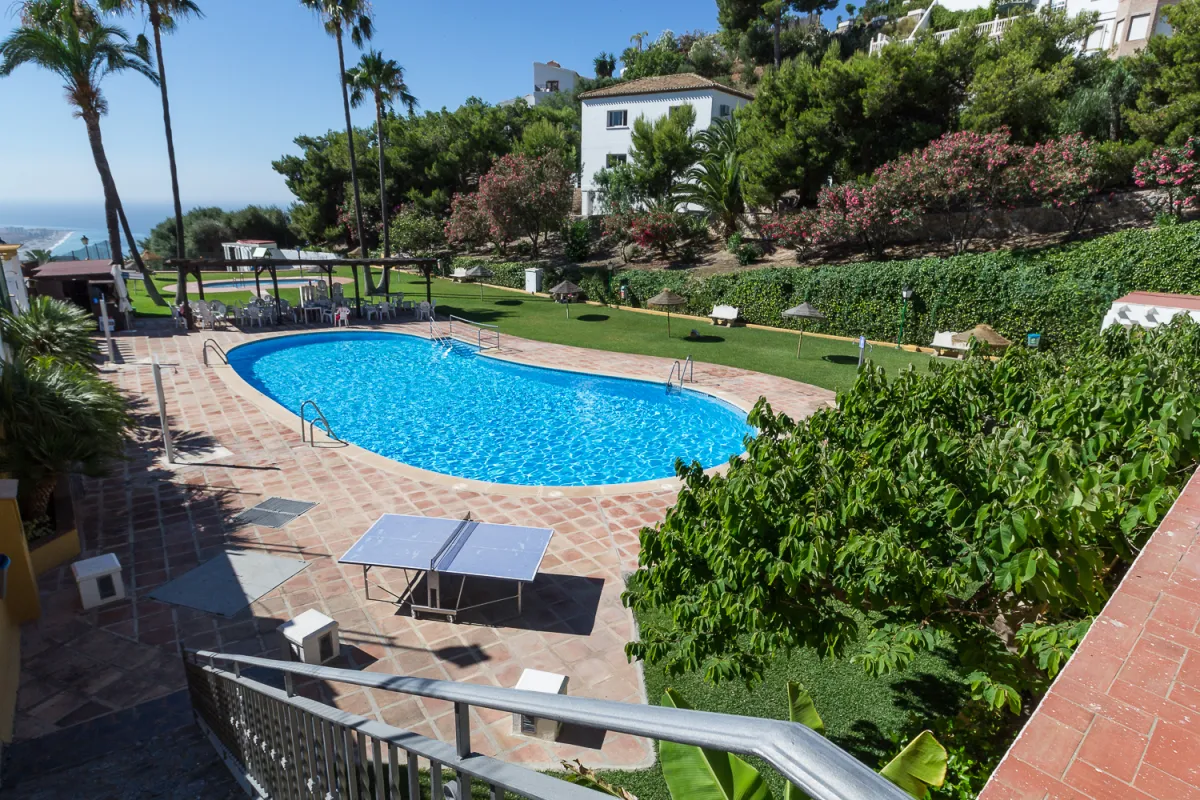 La zona común con piscina